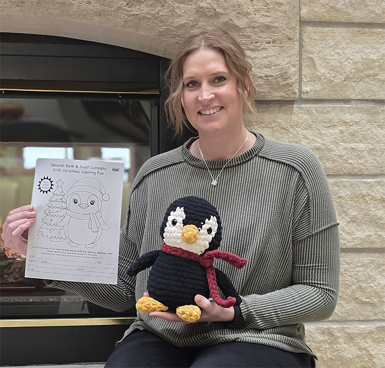 Bree Wilhelm with one of her handmade stuffed penguins Bree Wilhelm with one of her handmade stuffed penguins